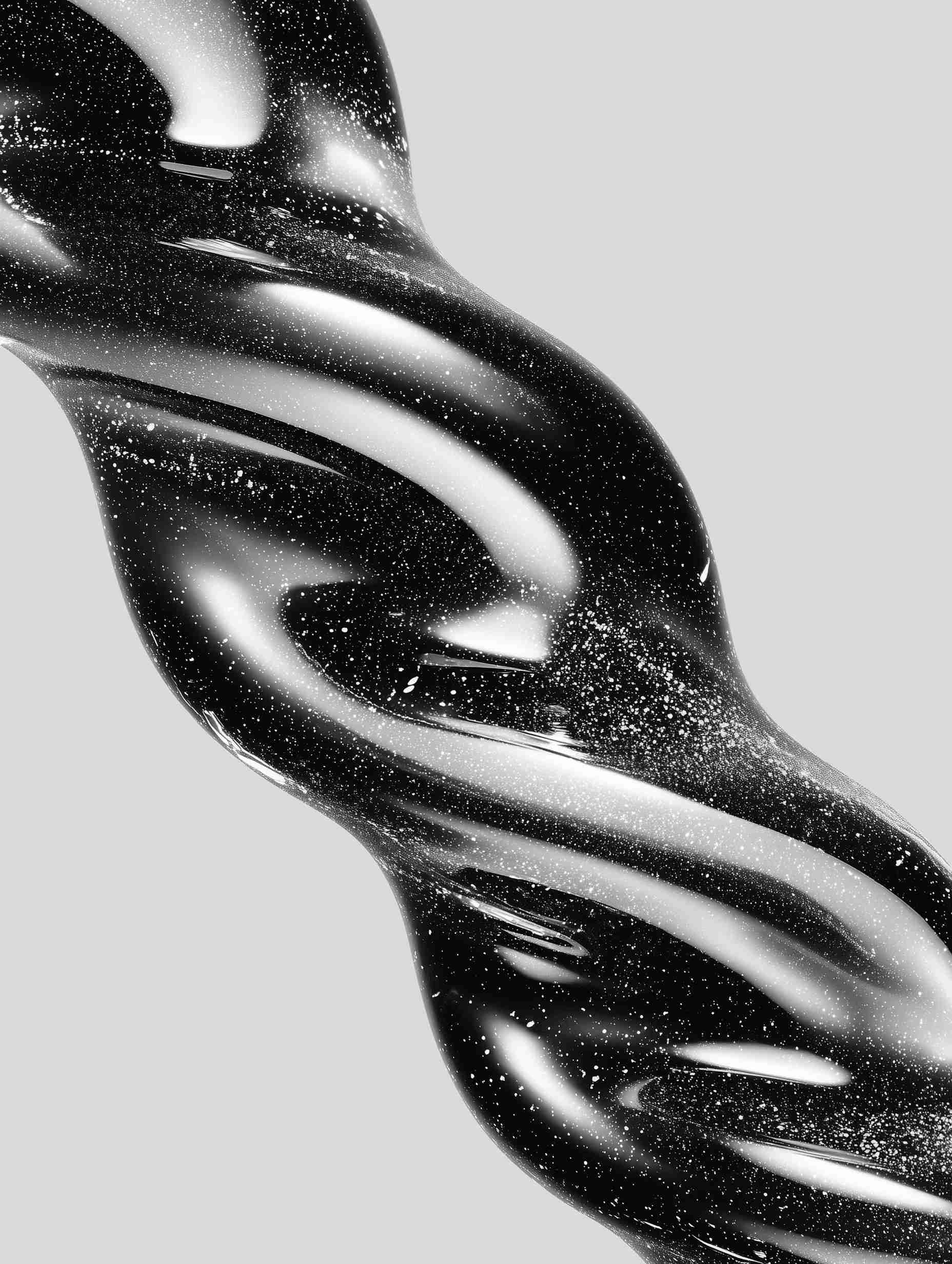Black and white swirling liquid product close-up