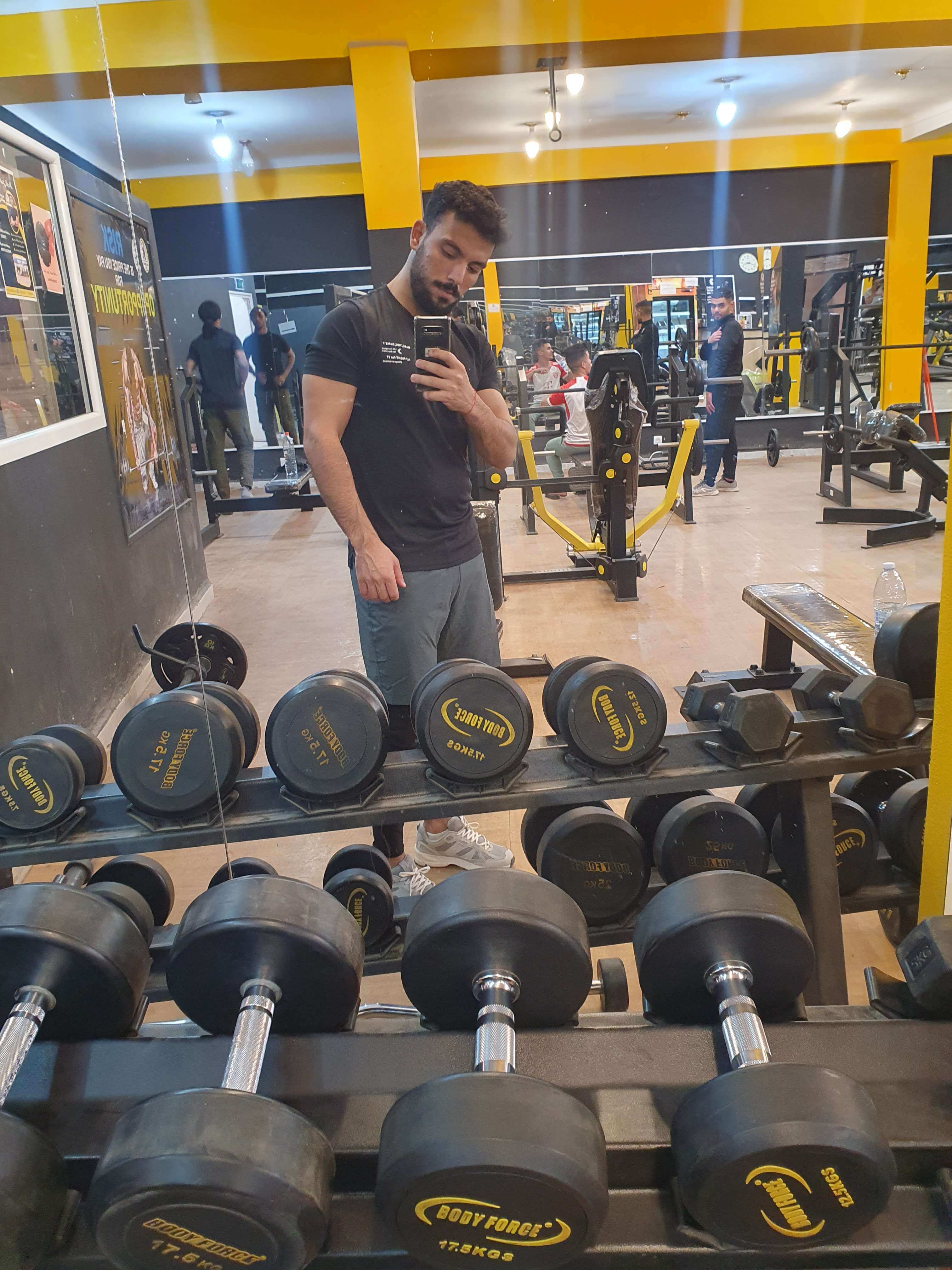 Portrait image on a mirror inside a gym