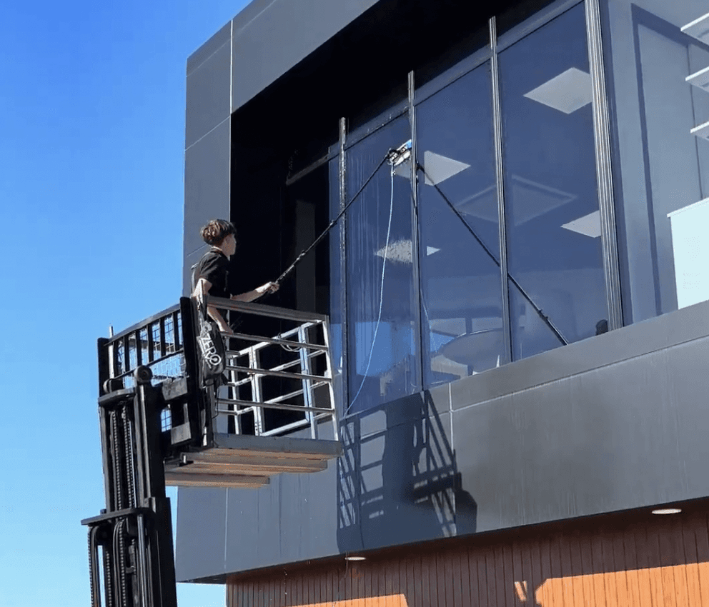 Professional window cleaning on a Hamilton commercial property by MJ Exterior Cleaning