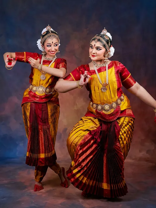 Group of dancers performing bharatanatyam in a stage