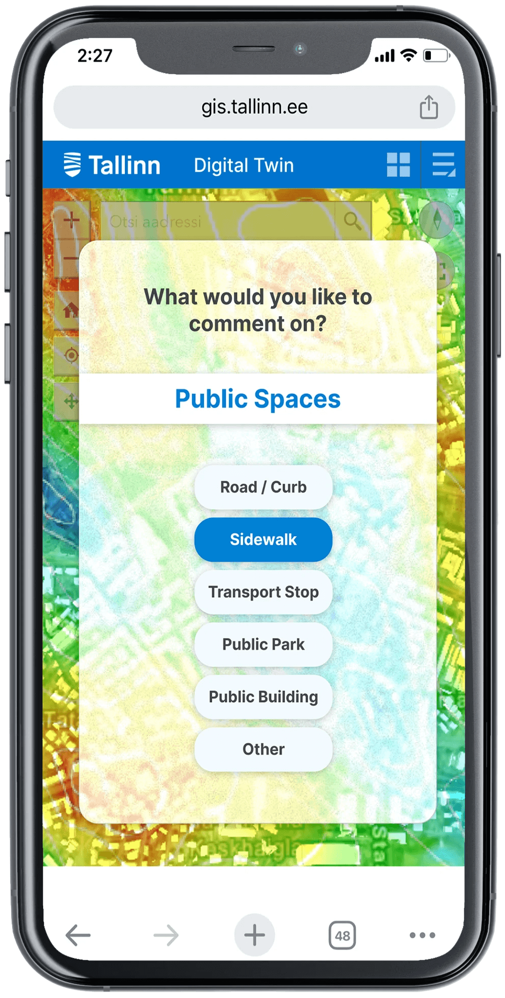 Phone screen prototype of TwinSight. The message popup says "What would you like to comment on?" There is a category of "Public Spaces" that has the options "Road / Curb", "Sidewalk", "Transport Stop", "Public Park", "Public Building", and "Other".