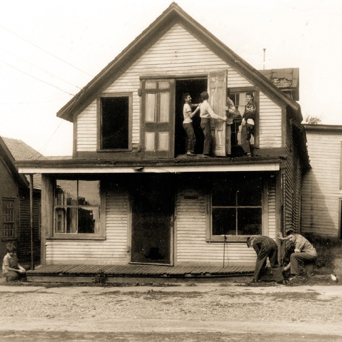 Local boys repairing the Harness Shop