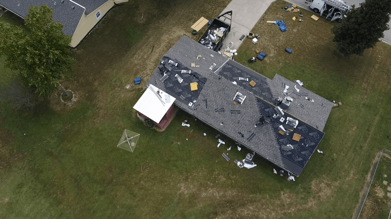 New TAMKO TITAN Class 3 Hail Rated shingles being installed by KCX roofers in Bonner Springs, KS