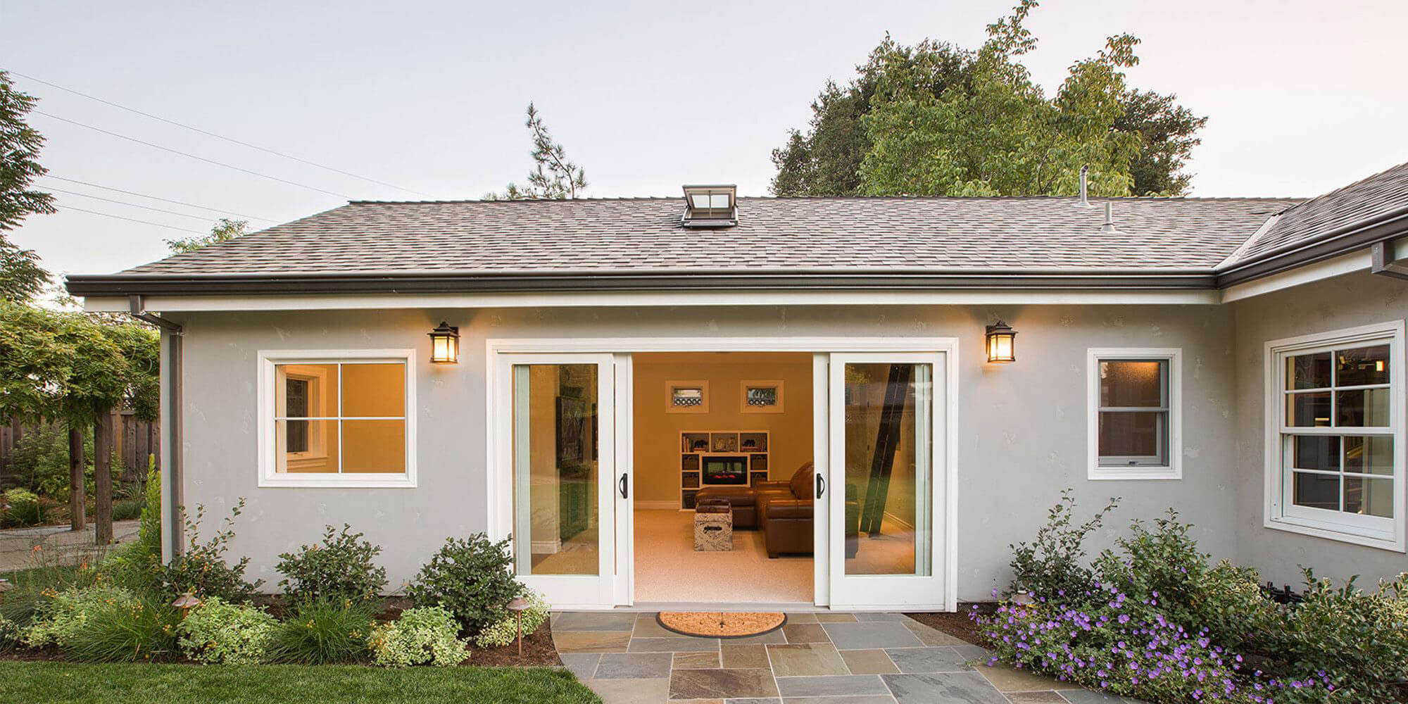 Attached adu elevation picture, featuring large doors opening to the backyard of the property.