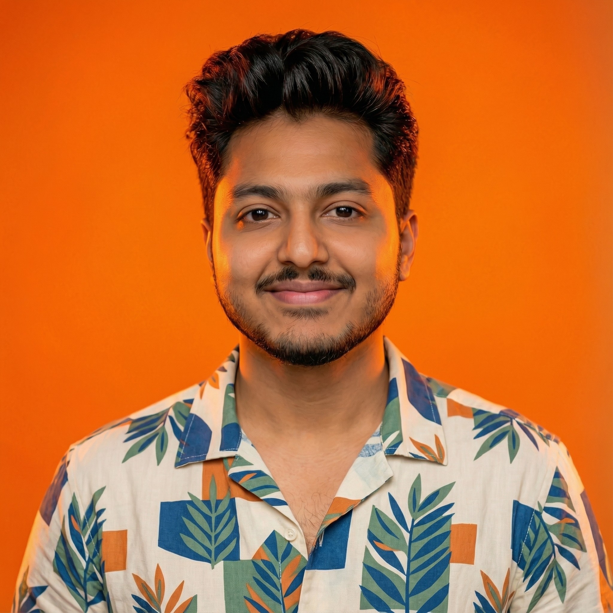 Person wearing a blue puffer jacket and red backpack standing in front of a light blue building on a city street.
