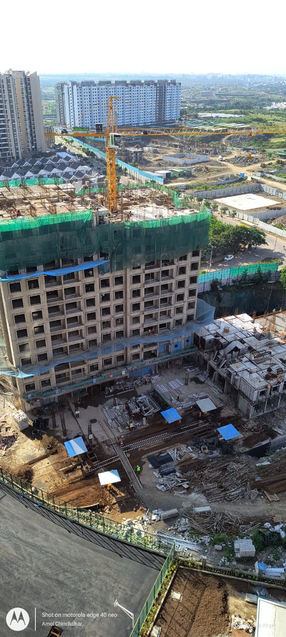 Safety net installation at high-rise construction site in Pune from above
