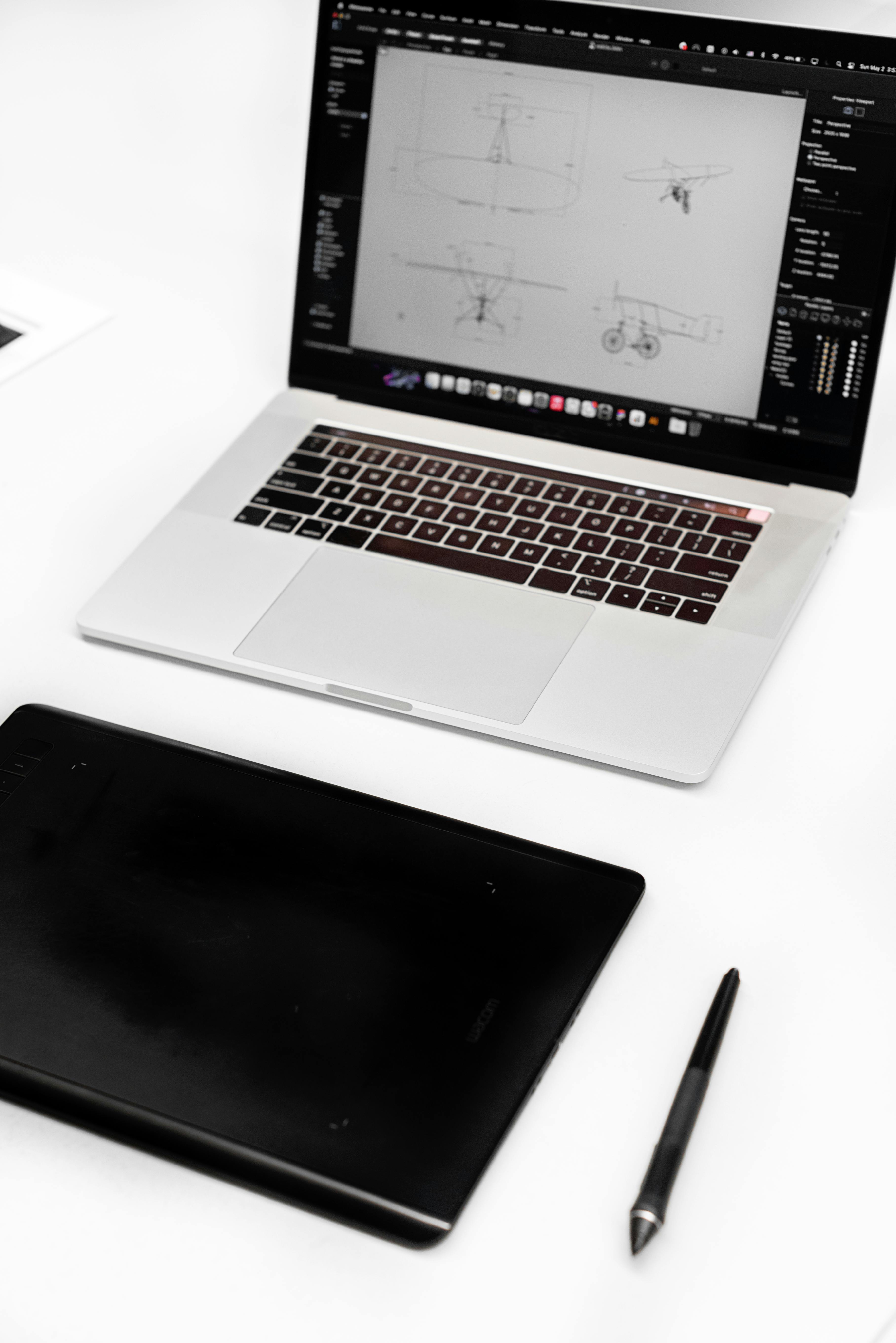 group of people using laptop computer