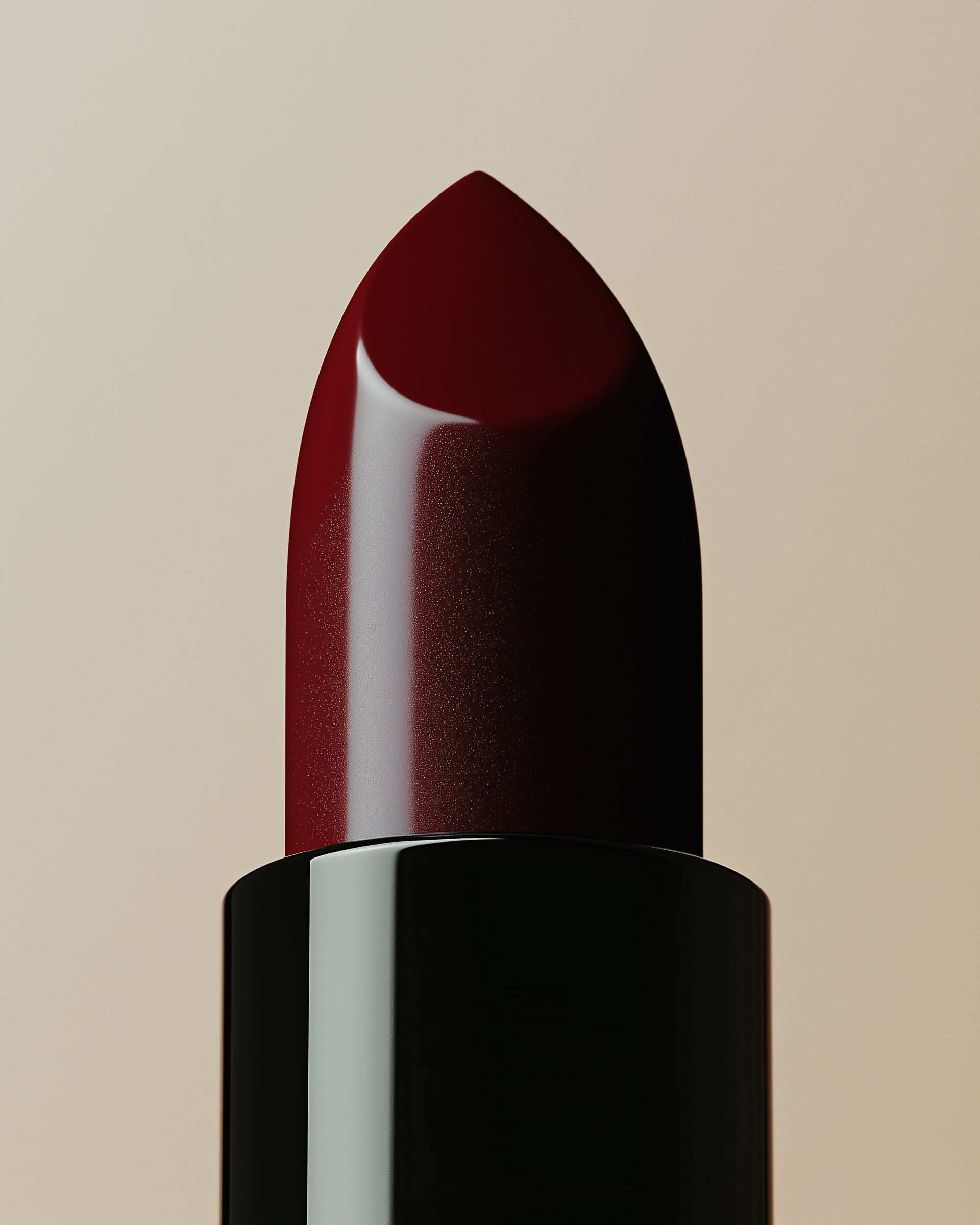 Deep burgundy lipstick with textured finish in black tube