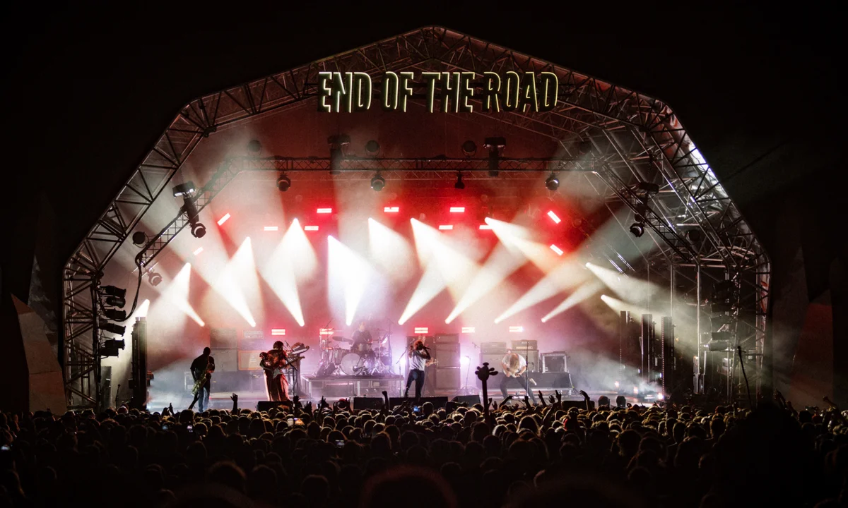 a person standing in front of a building