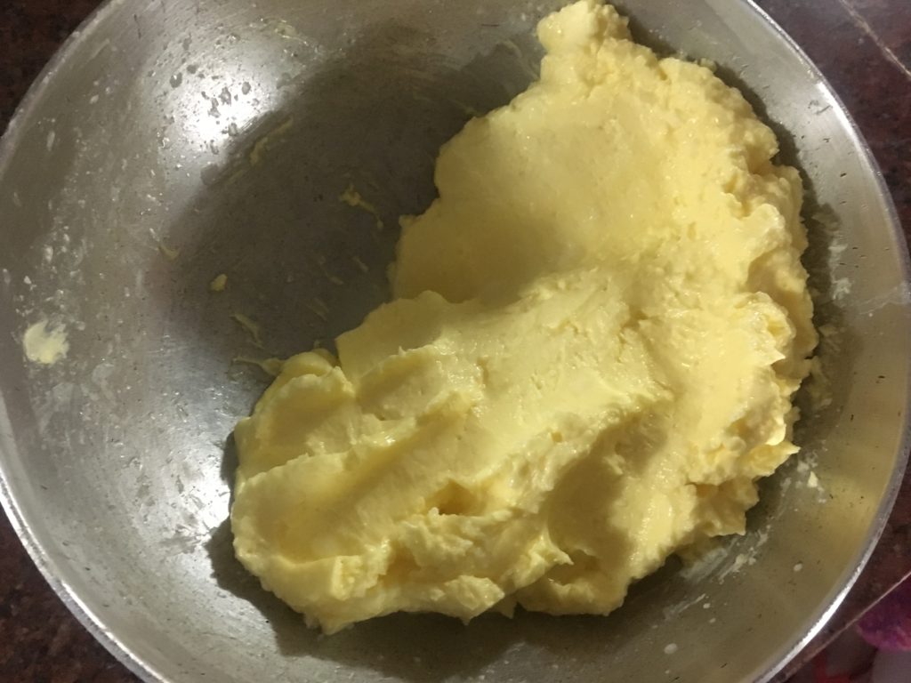 Churned and washed butter in a kadhai.