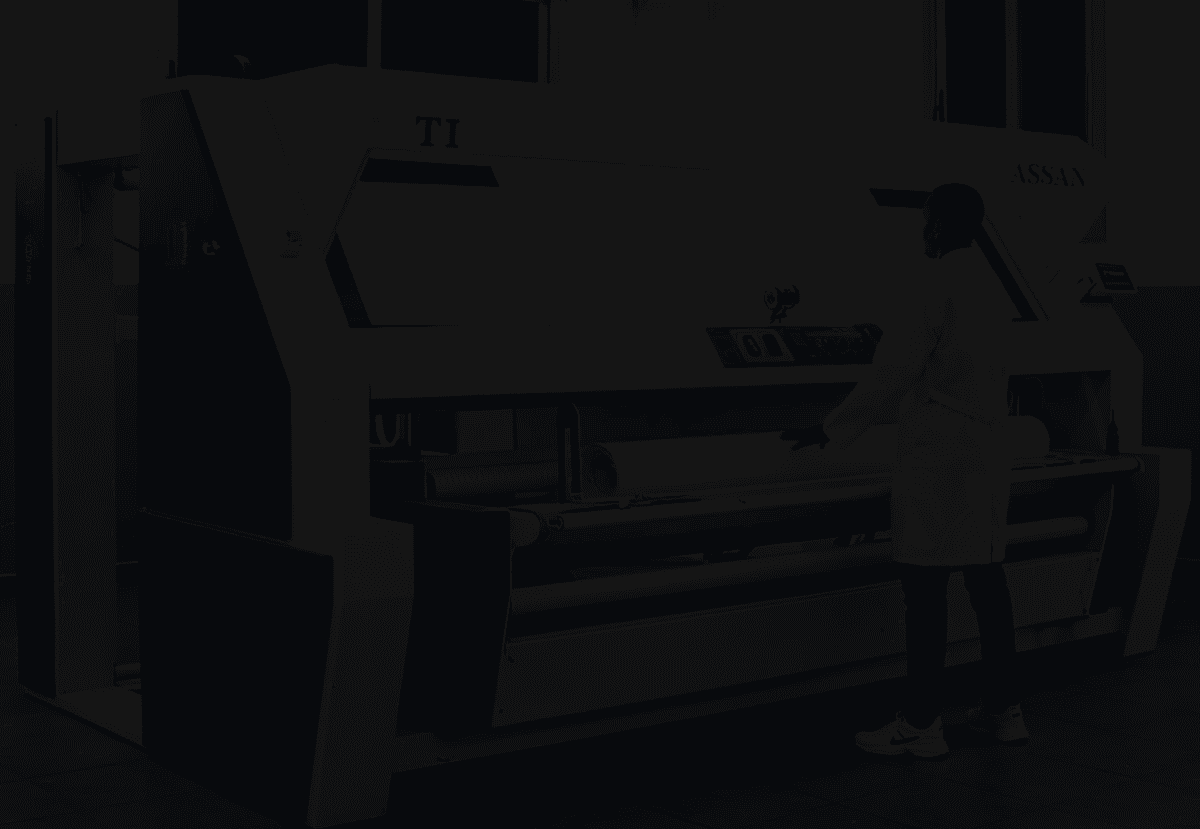 Industrial fabric processing machine.
