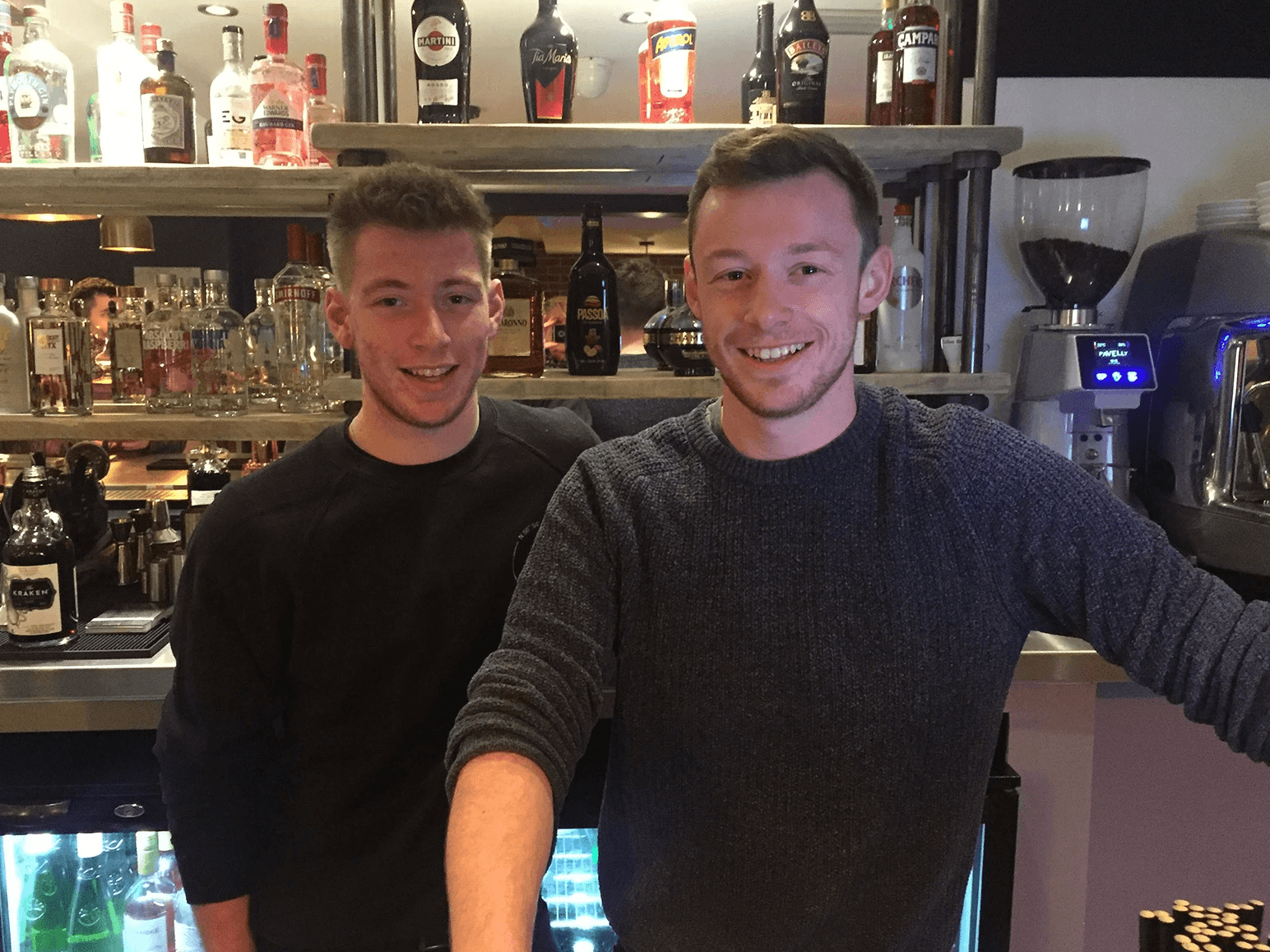 The founders of Labl.it, Rhys and Kyle, stood in their newly opened Smugglers restaurant in 2018.