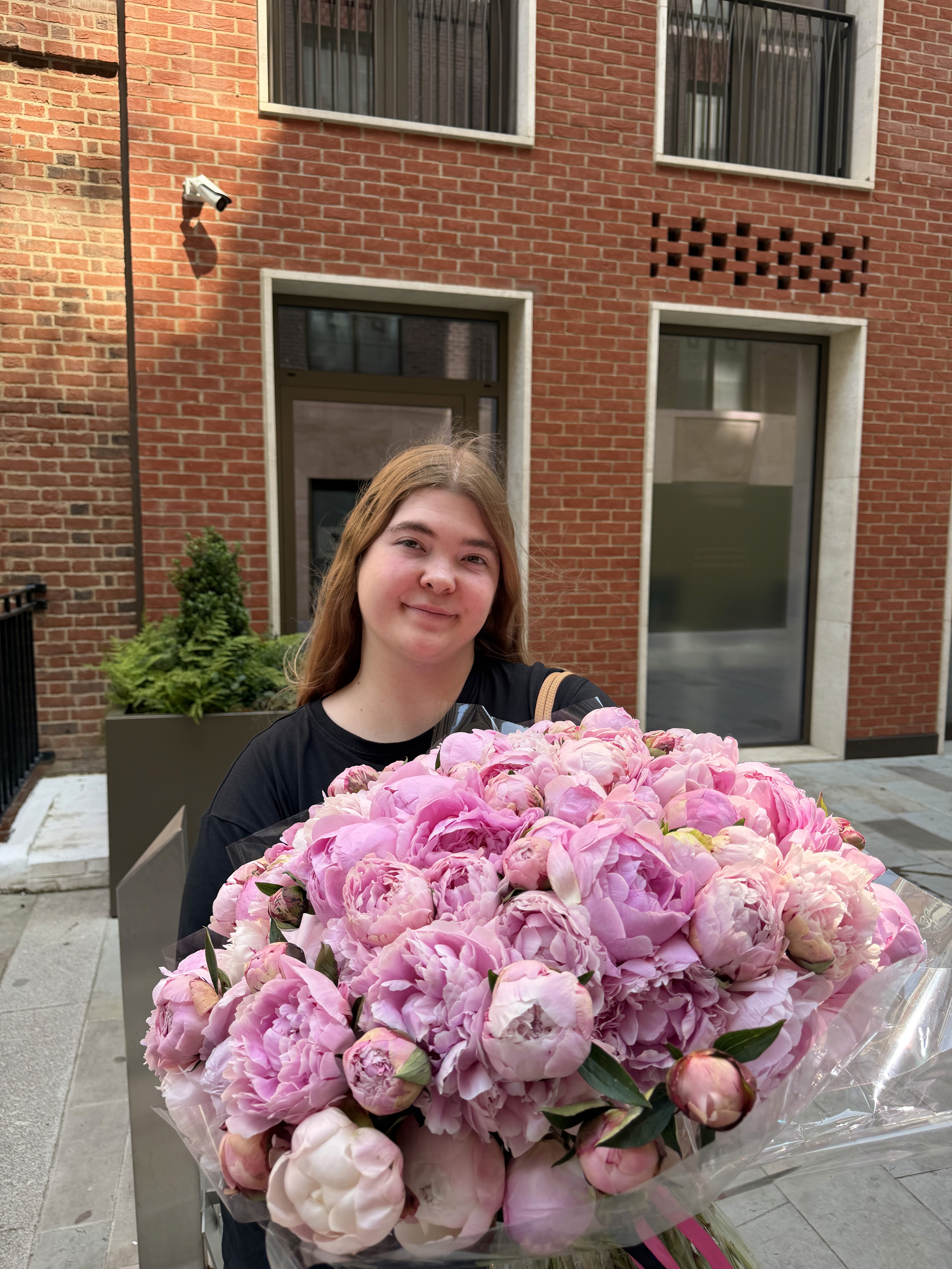 Perissology Courier handling luxury florals