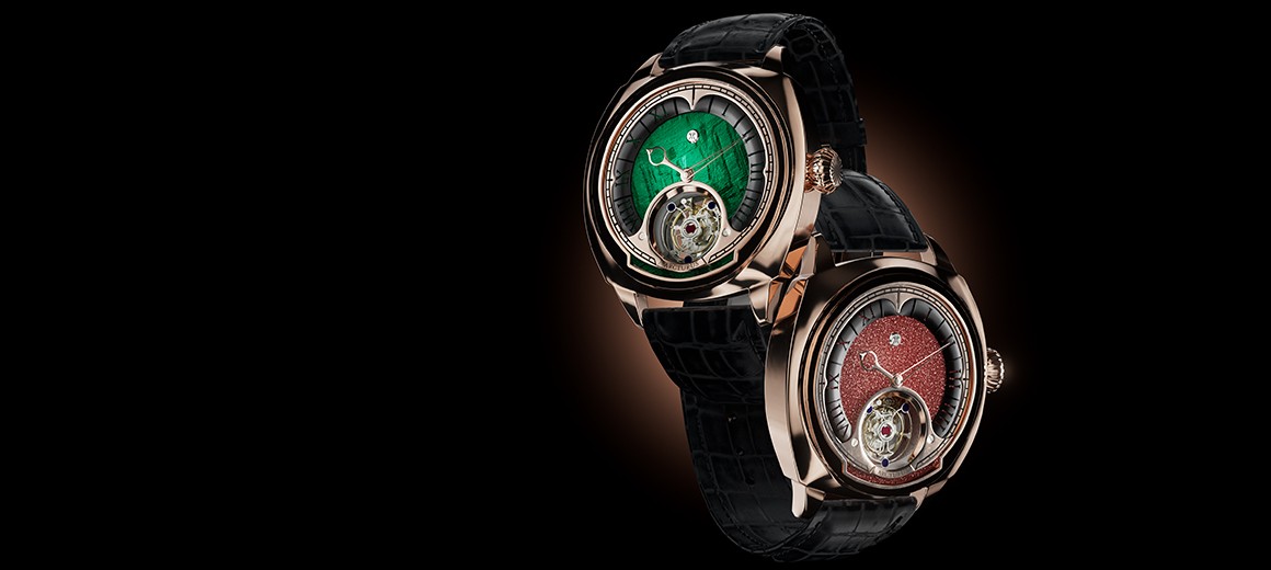 A person stands in a sandstone cave.