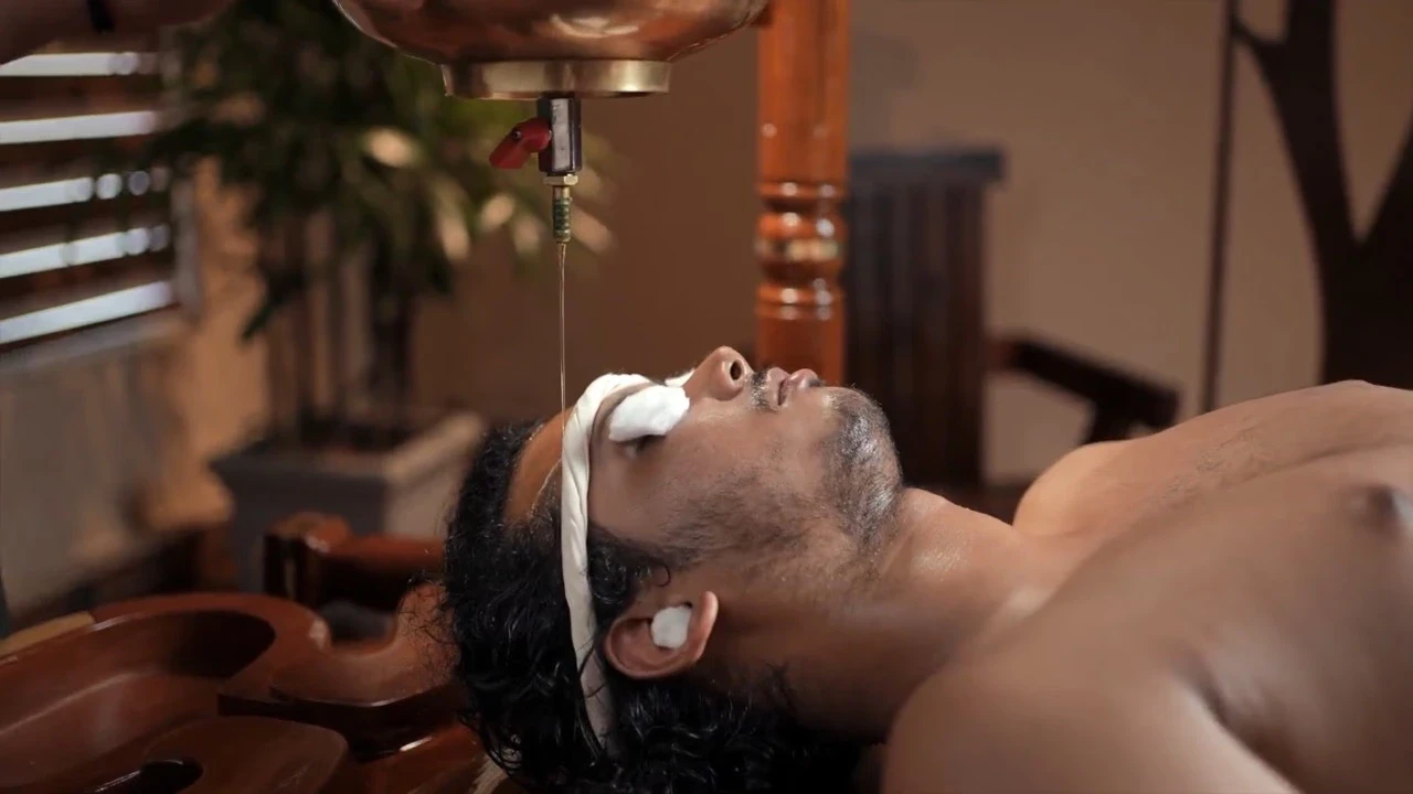 Shirodhara therapy at Au Revoir Wellness Resort, Palakkad — Ayurvedic oil treatment for deep relaxation and mental rejuvenation.