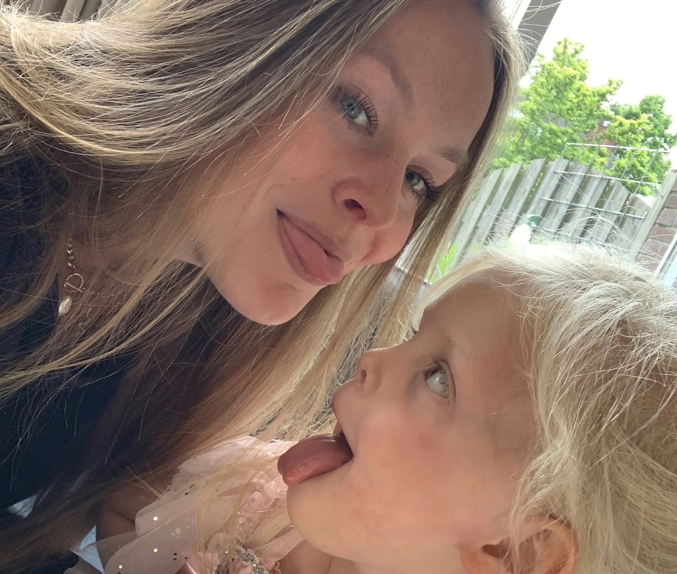 Angel Rosalie and the child she is babysitting during her babysitting shift