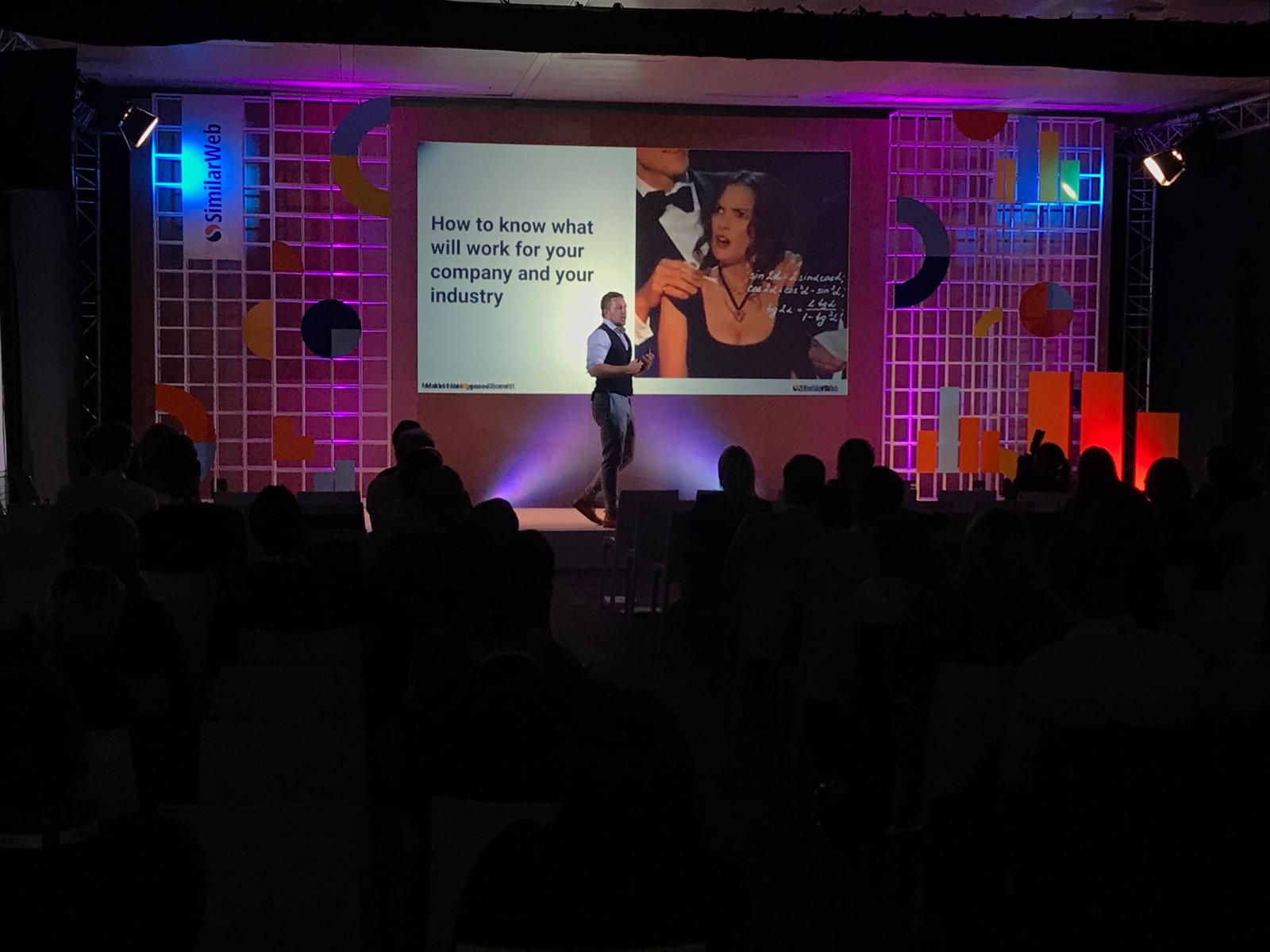 Tomas Seliokas speaking on stage at a Similarweb event