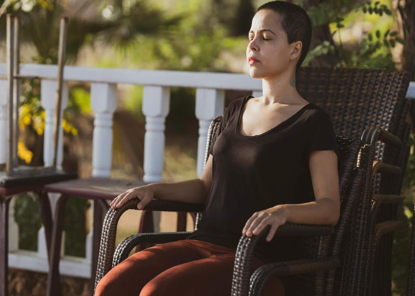 Can meditation help you sleep? Woman resting meditatively in a chair