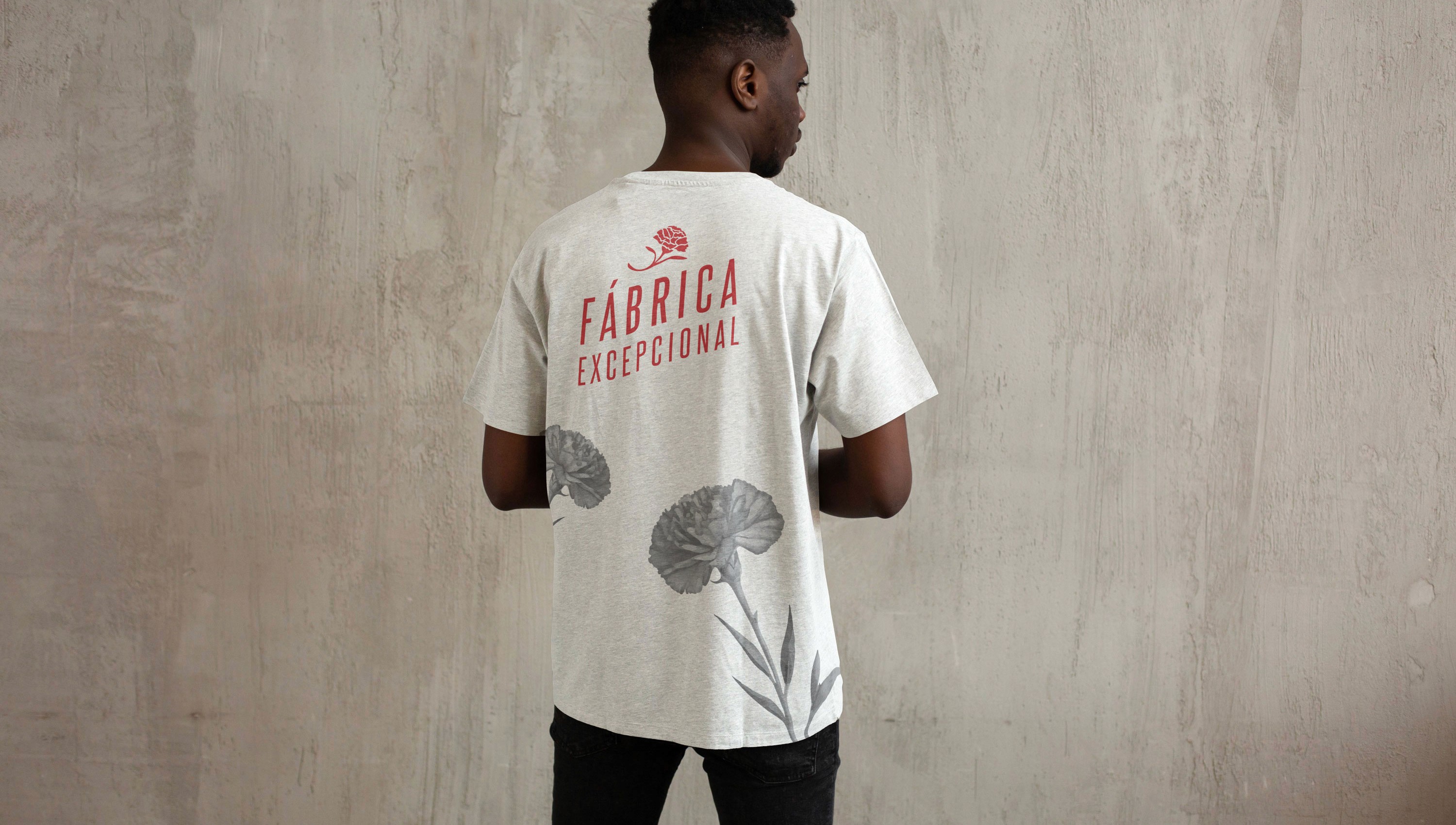 Branded t-shirt featuring custom artwork on the back