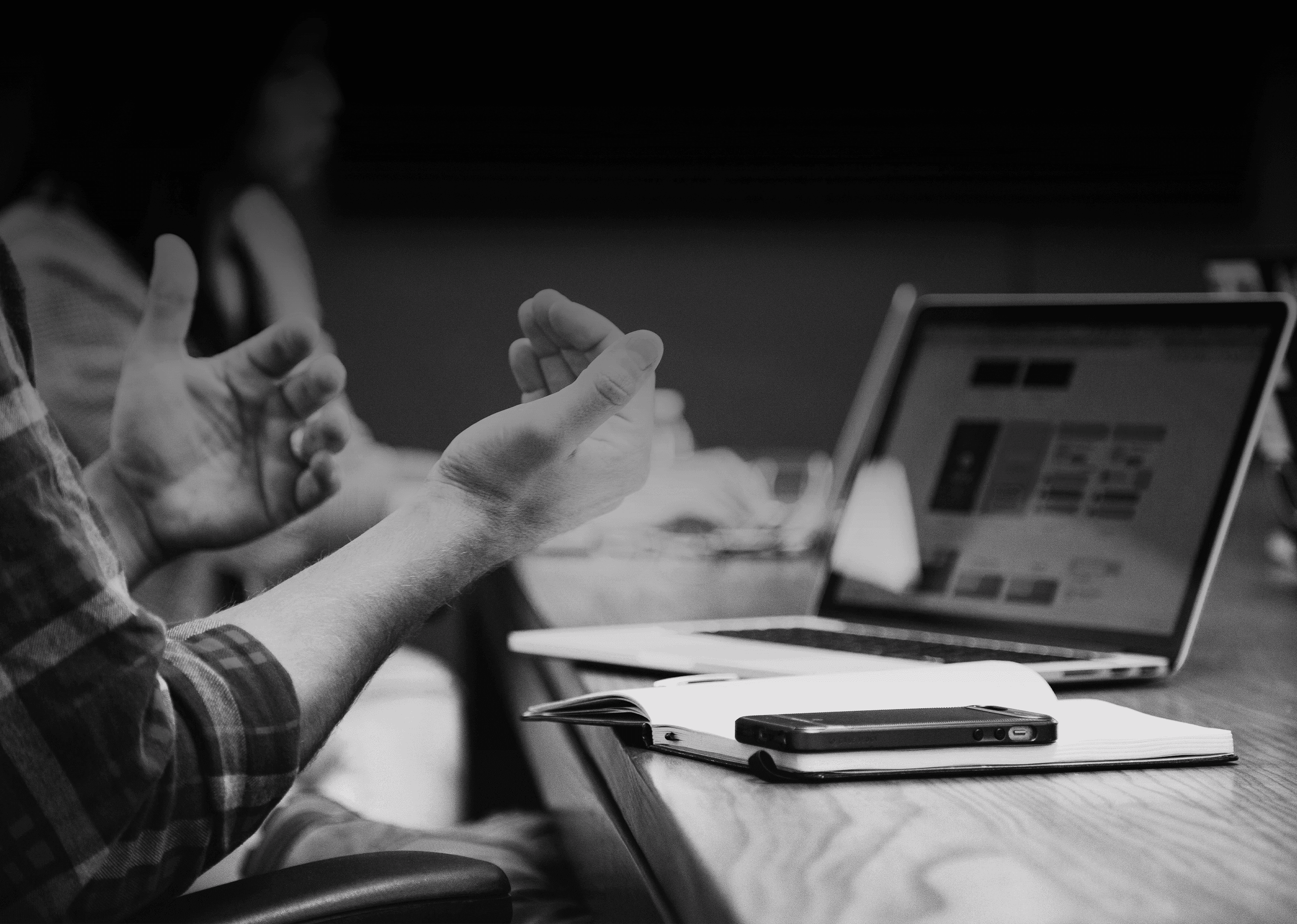 people sitting on chair in front of laptop computers