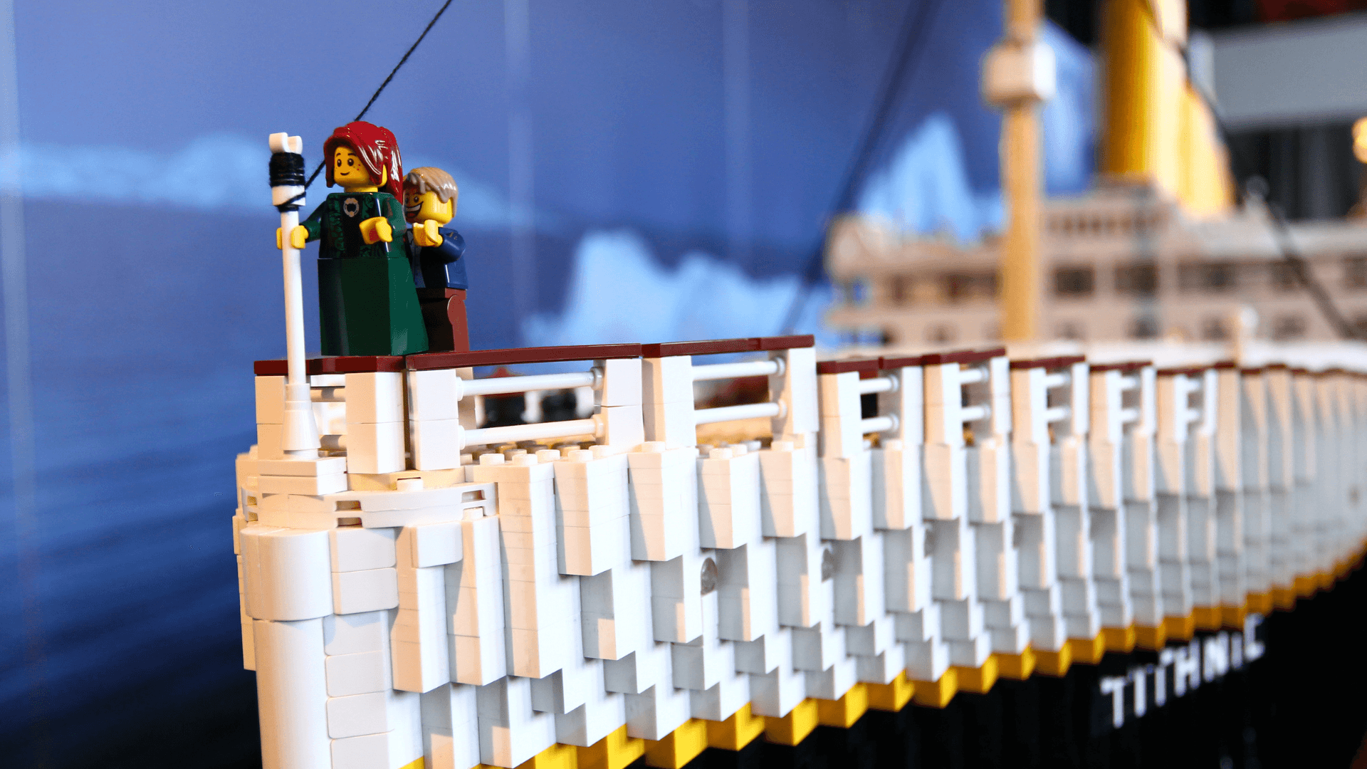 A LEGO® Jack and Rose from the Titanic movie stand at the bow of the LEGO® Titanic ship.