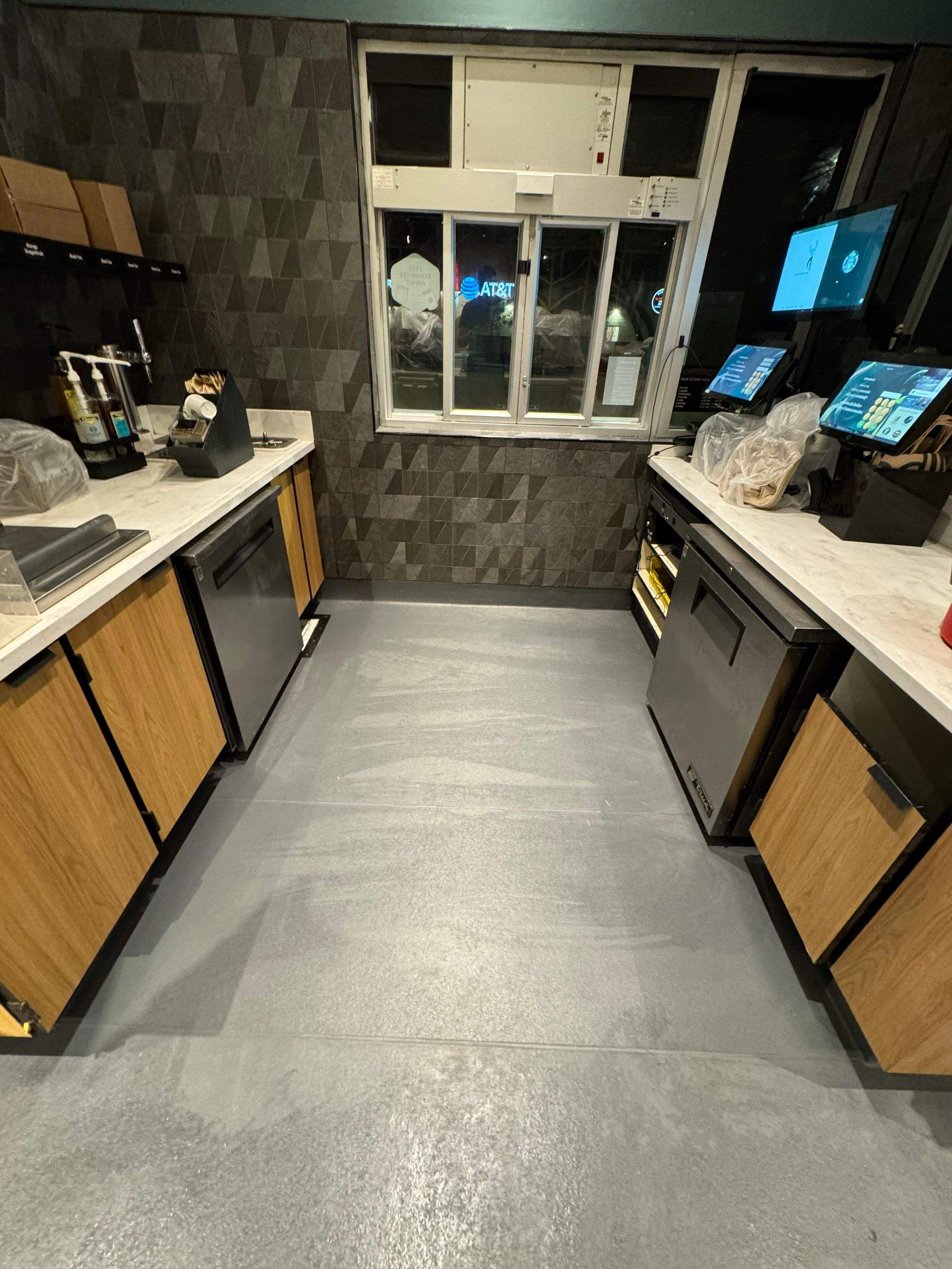 Smooth, straight Eco-Grip floor seam line flush with adjacent panels, reflecting precise installation.