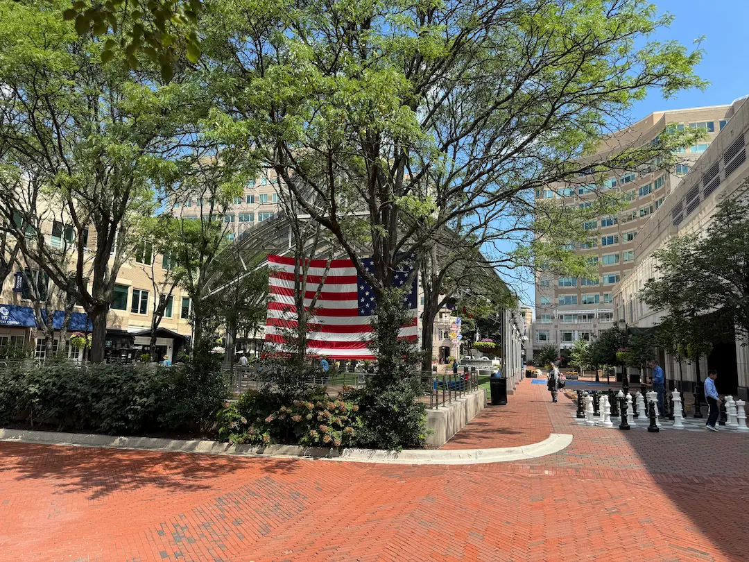Reston Town Center plaza with commercial buildings and brick walkways, serviced by an expert plumber in Reston, VA.
