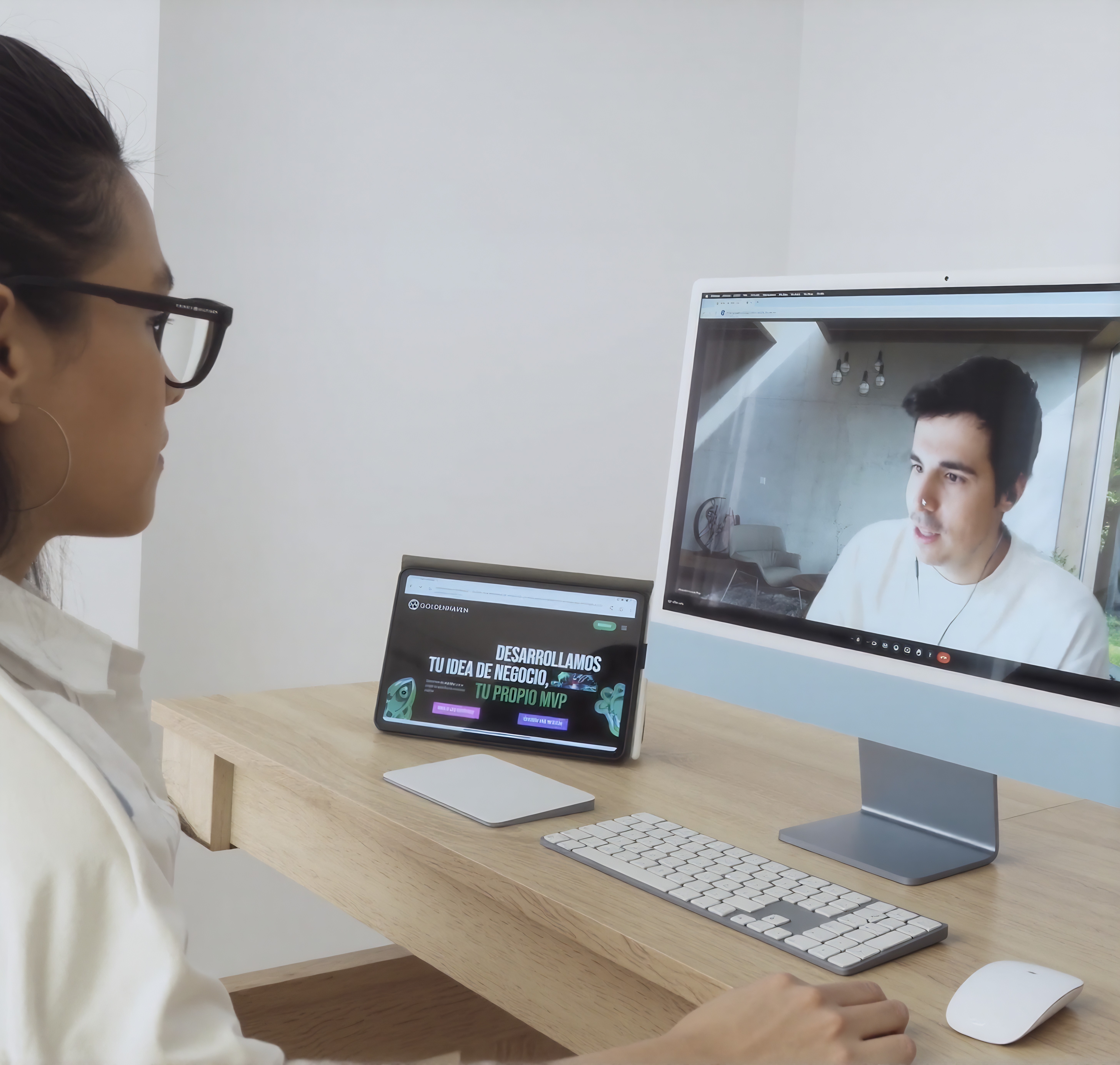 Creative workspace with large windows and a wall full of inspiration boards.