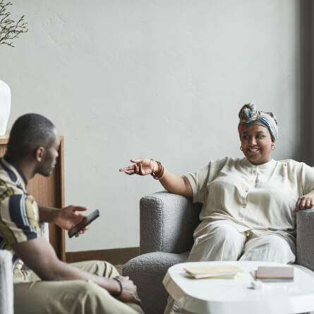 A man and a woman talking to each other