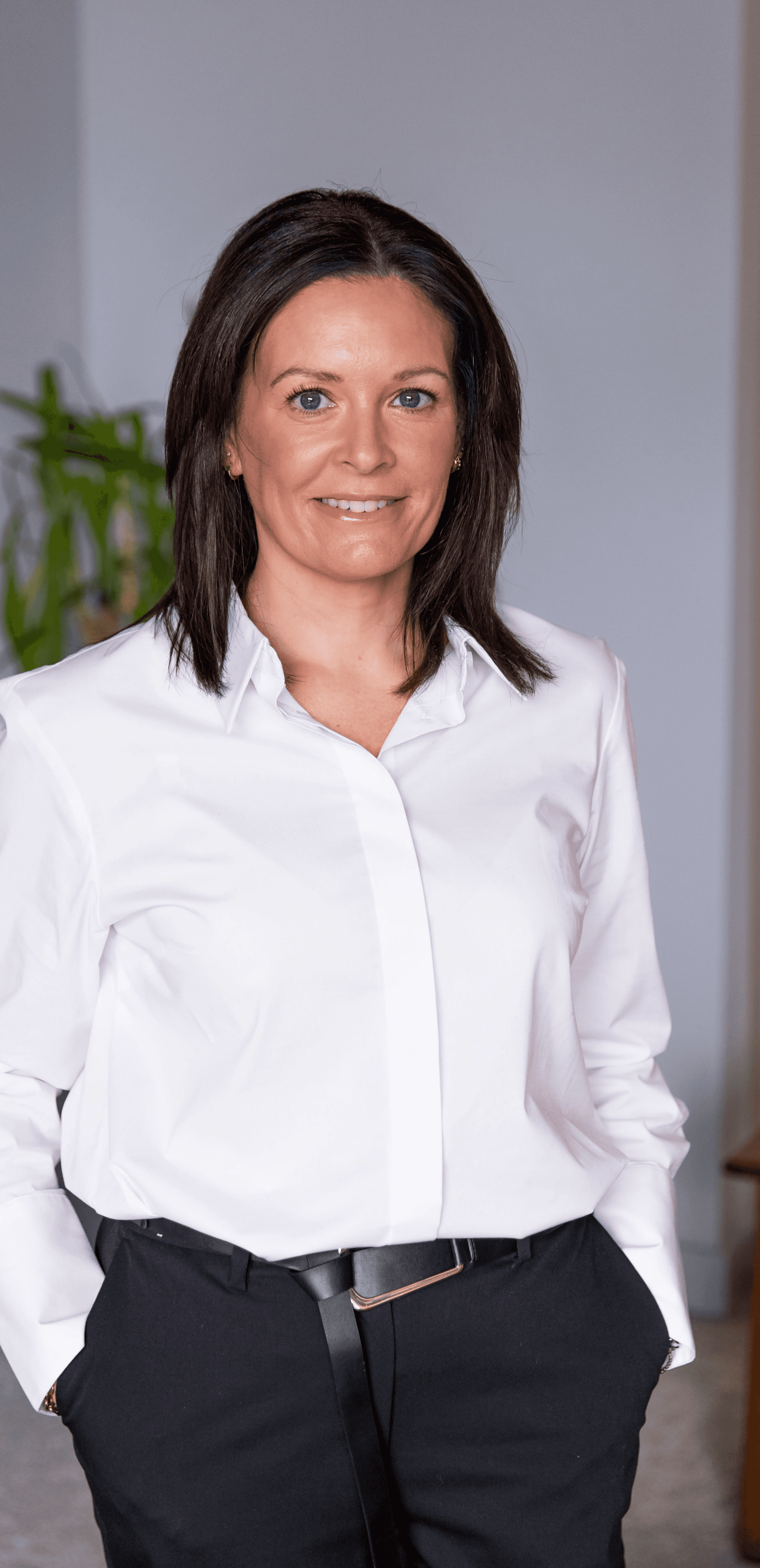 professional headshot of natalie wearing a white shirt