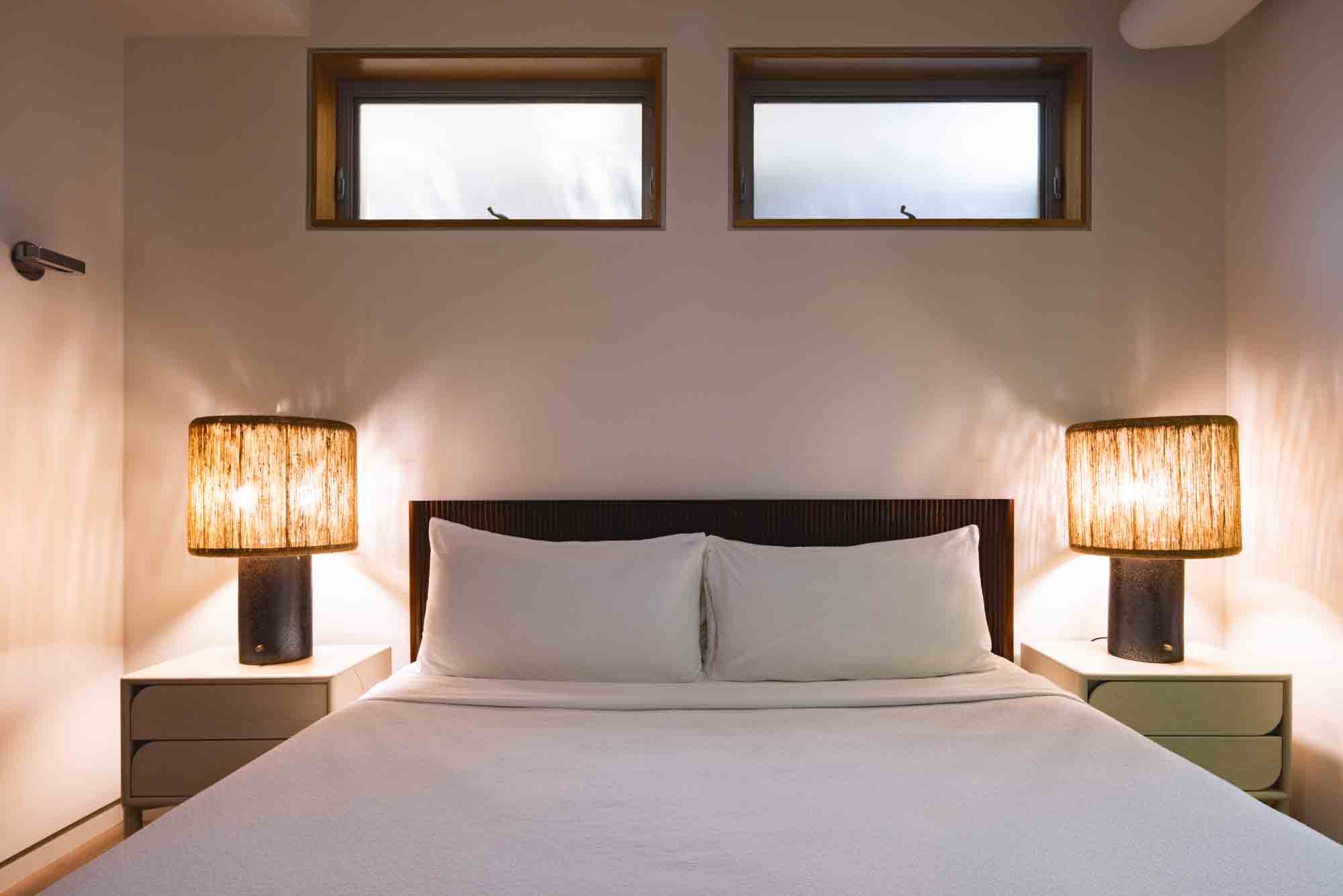 bedroom with minimalist decor, blending style and comfort in contemporary Key West lodging