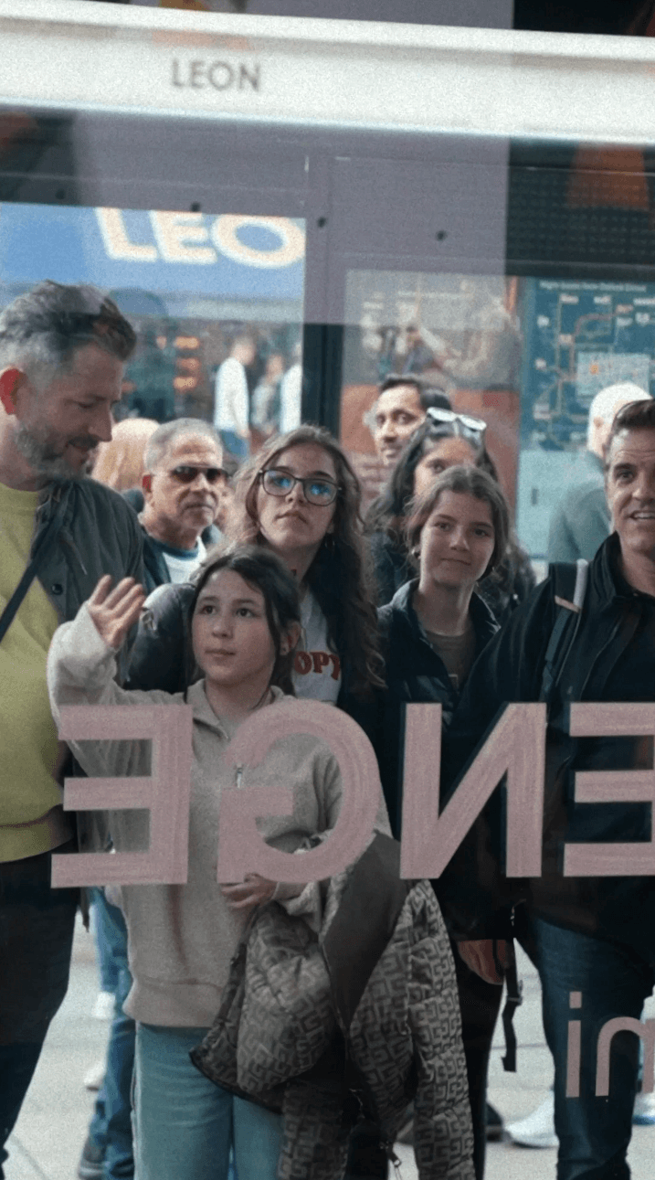 Bride and groom walking on street at night