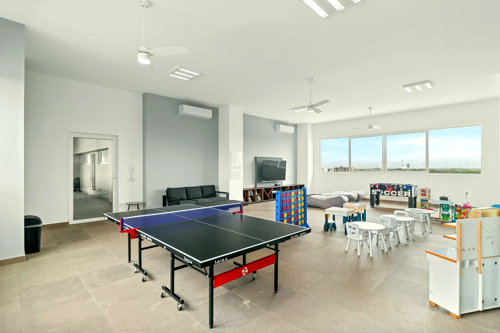 Sala de juegos del Departamento D’Toscana Residencial