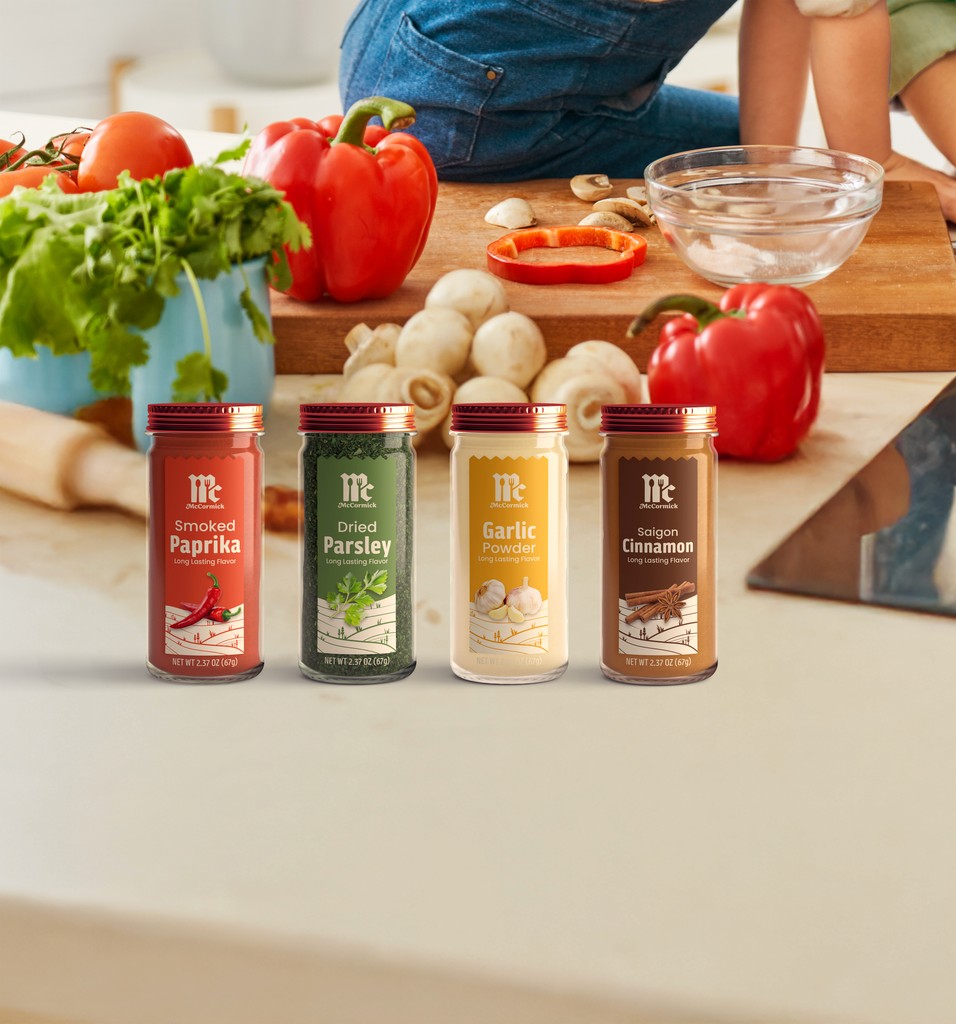 Redesigned McCormick spice bottles on a kitchen countertop.