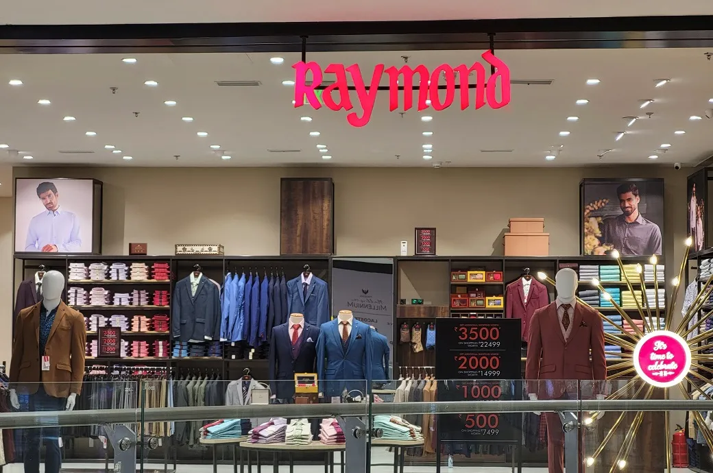 Raymond Lifestyle FY26 results, Raymond Q2 revenue 2025, Indian fashion retail growth, textile industry India, Raymond branded apparel, US tariff impact, Raymond financial report, fashion retail India, Raymond domestic demand, Raymond EBITDA
