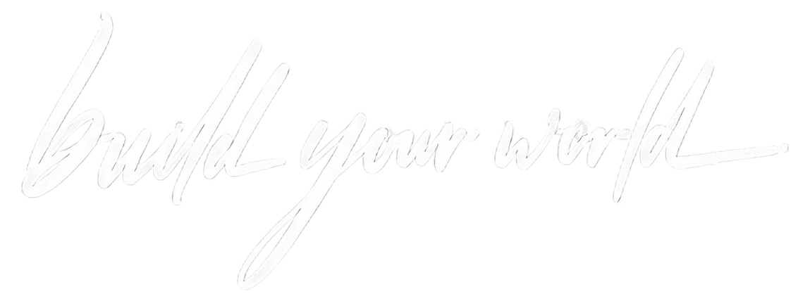 "Build your world" subtext of the emagineer logo. It is in a white cursive font.