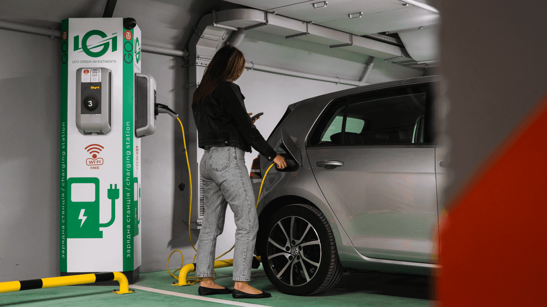 Electric vehicle charging station in a European urban setting, symbolizing the EU’s shift towards sustainable transport.