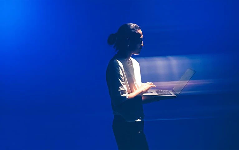 African man smiling on phone