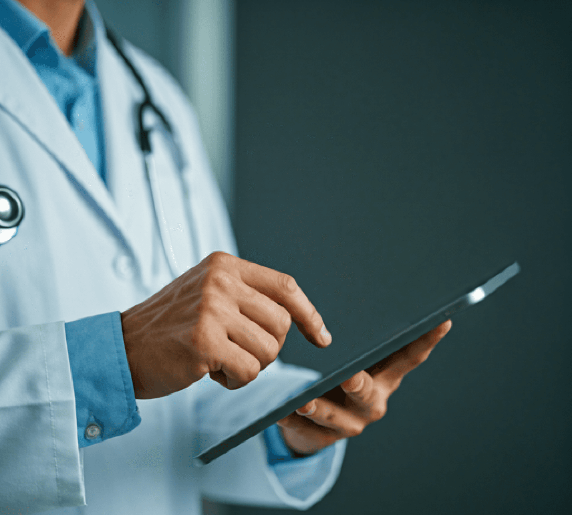 Medical professional using a tablet