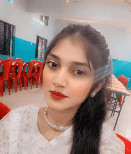 Close-up of blue flowers, glistening with droplets of water, creating a serene and calming atmosphere.