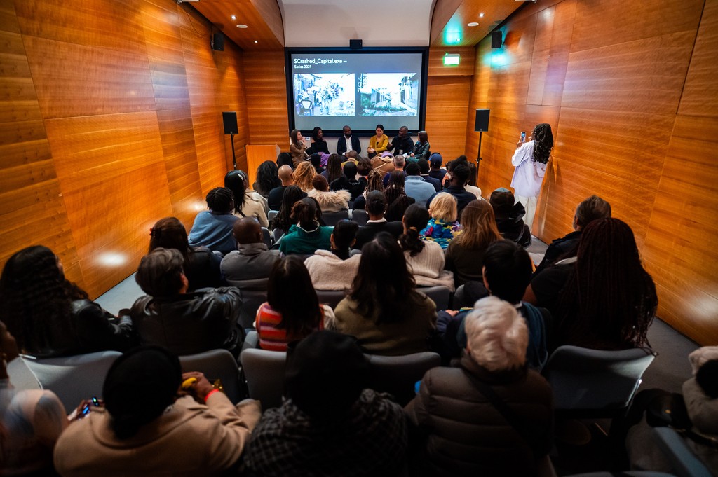 Founder Alain Defise speaking to crowd at opening party
