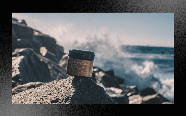 A product image of a face product and a rock.