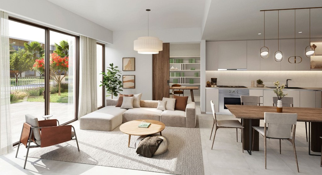 Stylish living room and dining area with outdoor views, designed for comfort at Orania The Valley.