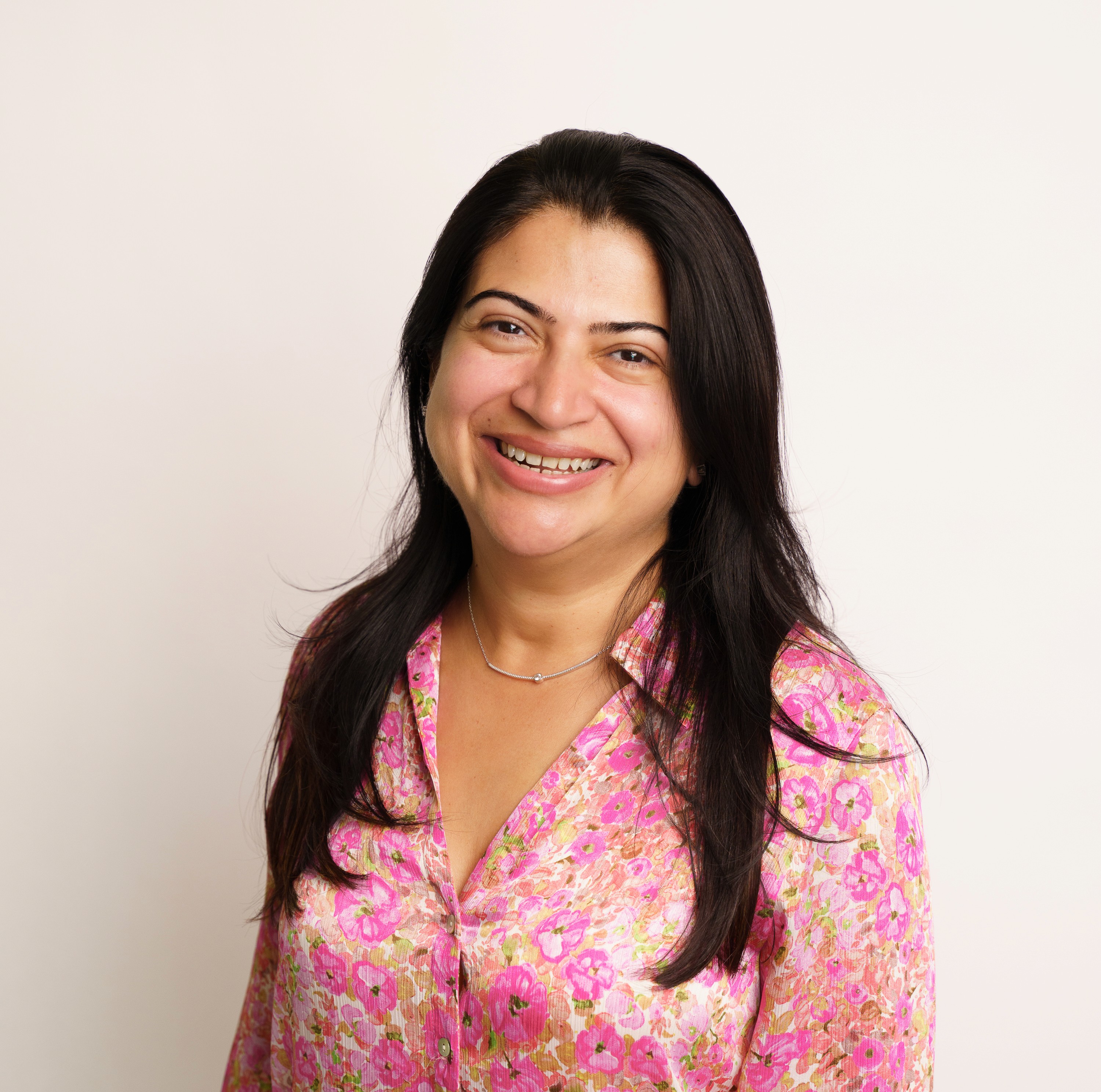 person sitting in a chair in front of a man