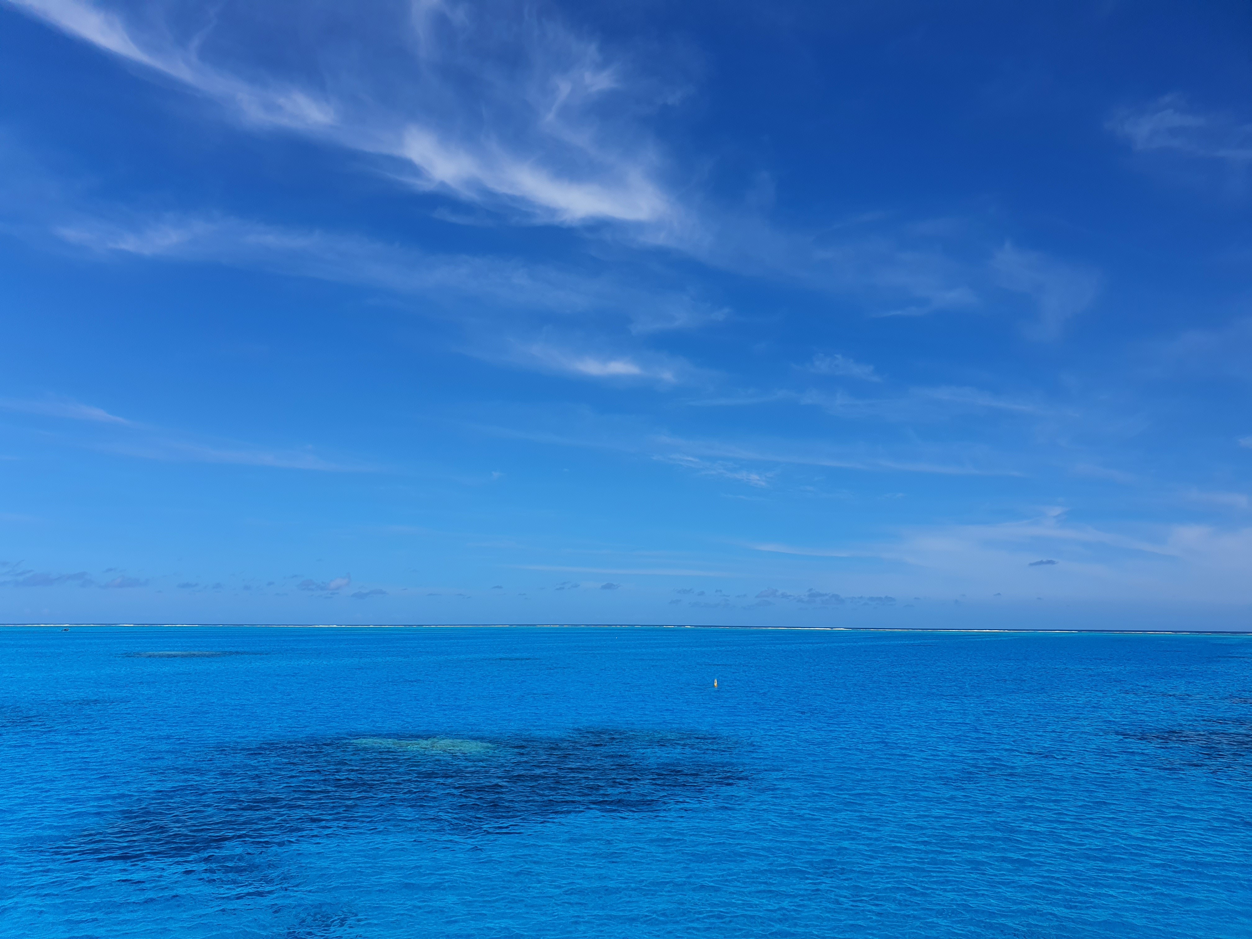 A man with surfboard at beach