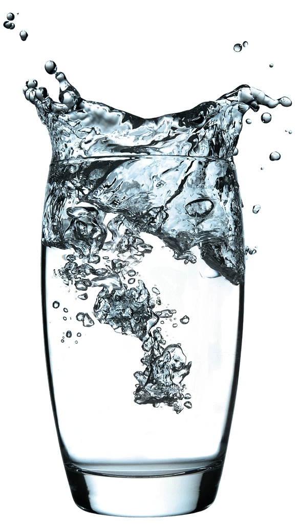 a bottle of water with water splashing around it