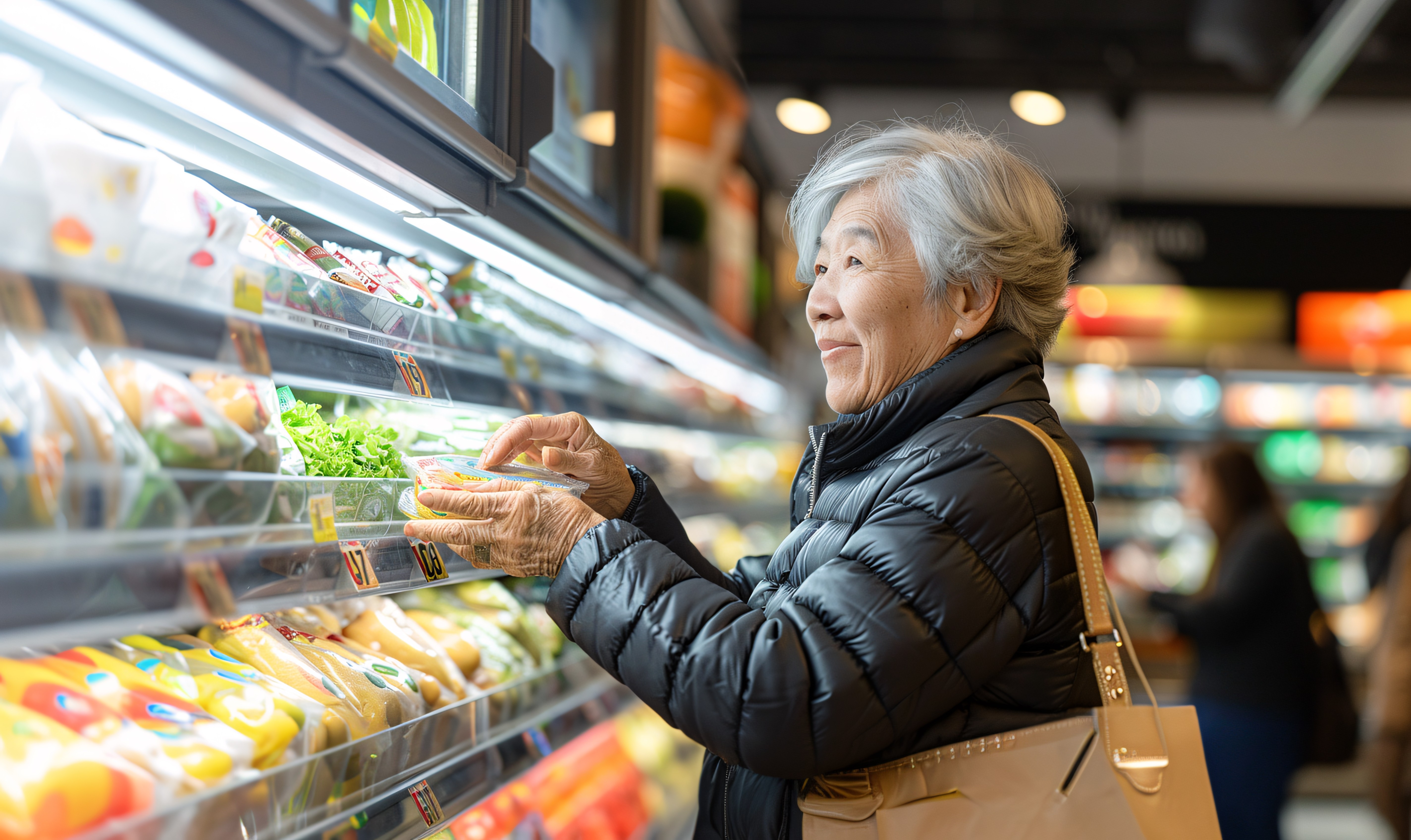 Two men and lady packaging boxes