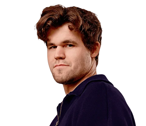 Smiling young man with curly hair, wearing a dark hoodie, against a softly lit background.