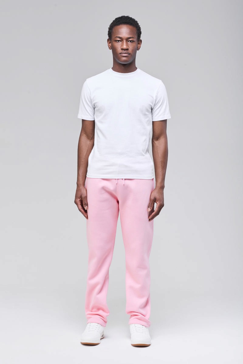 Sunday Superior Langley Sweatpants in soft pink, male model front view