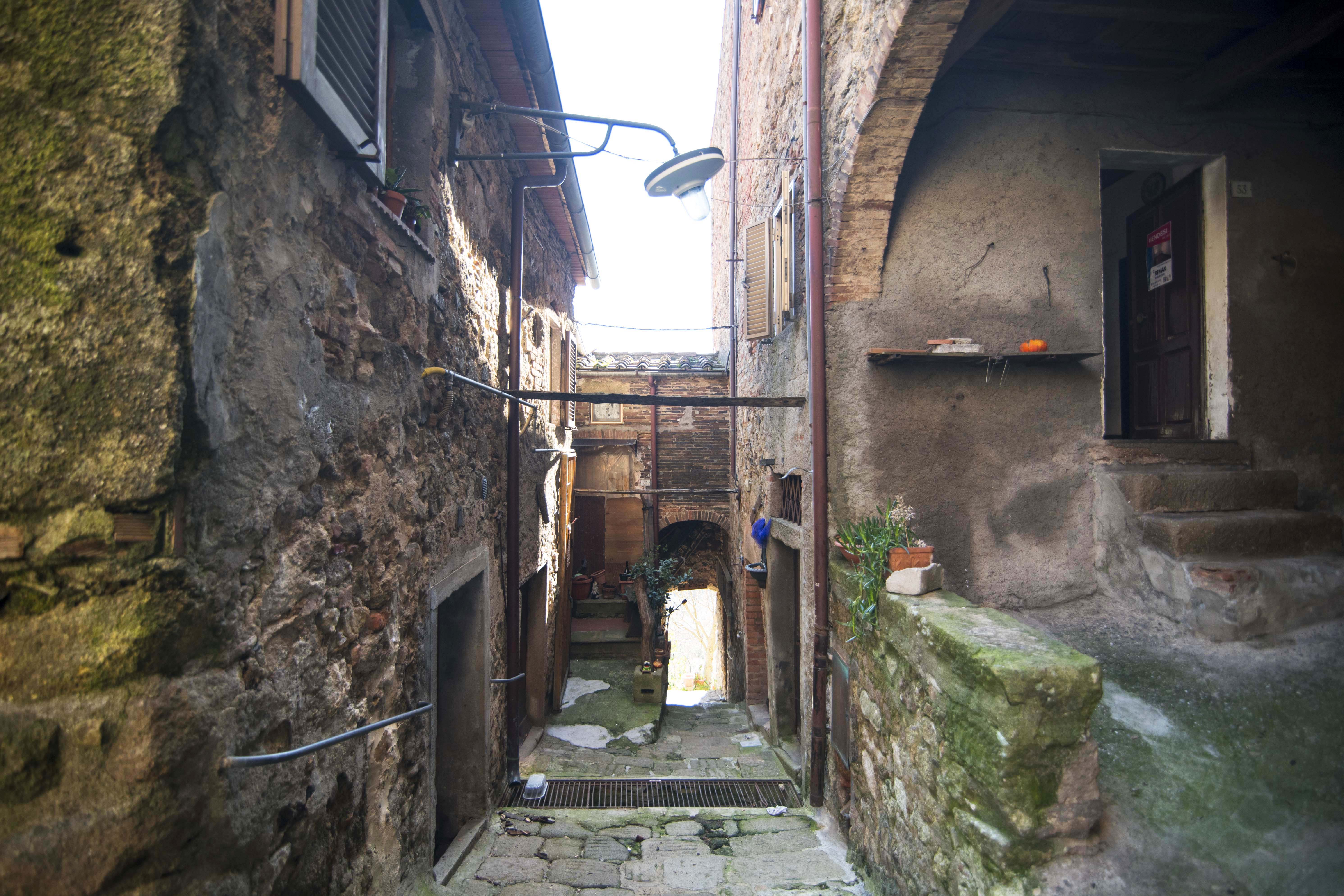 Narros stone lane in a village of the tuscan Maremma, province of Grosseto